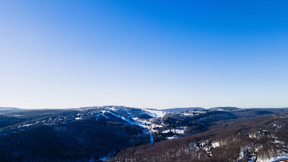 Aerial Snow Laurel Hill Lake Area Seven Springs