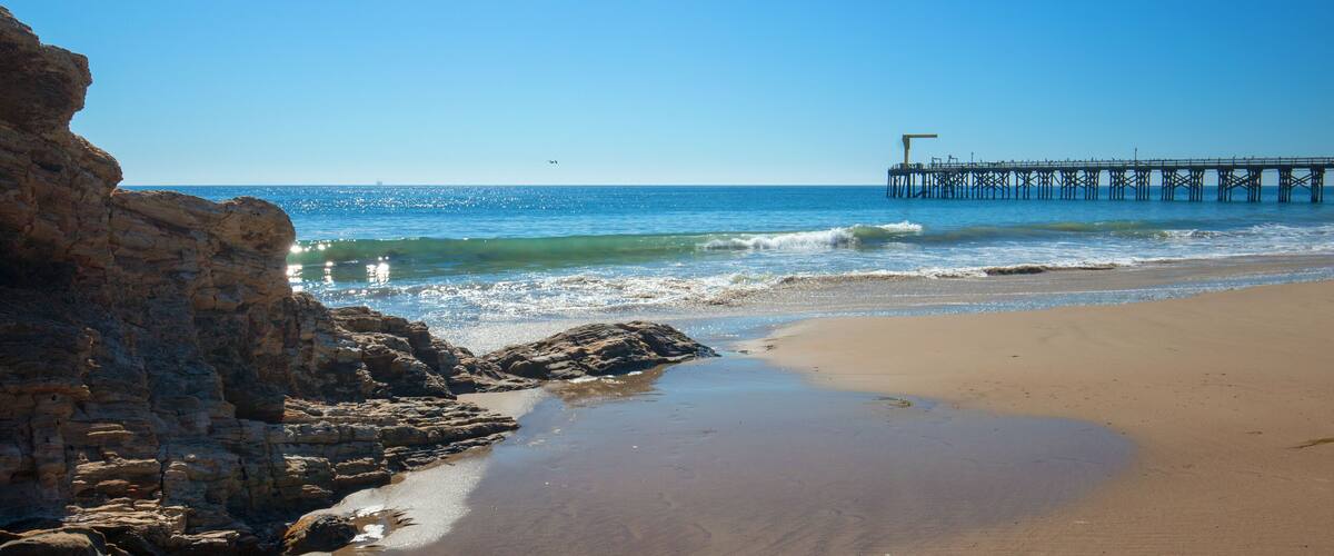 Fishing pier and boat hoist at Gaviota Beach on the central coast of California United States