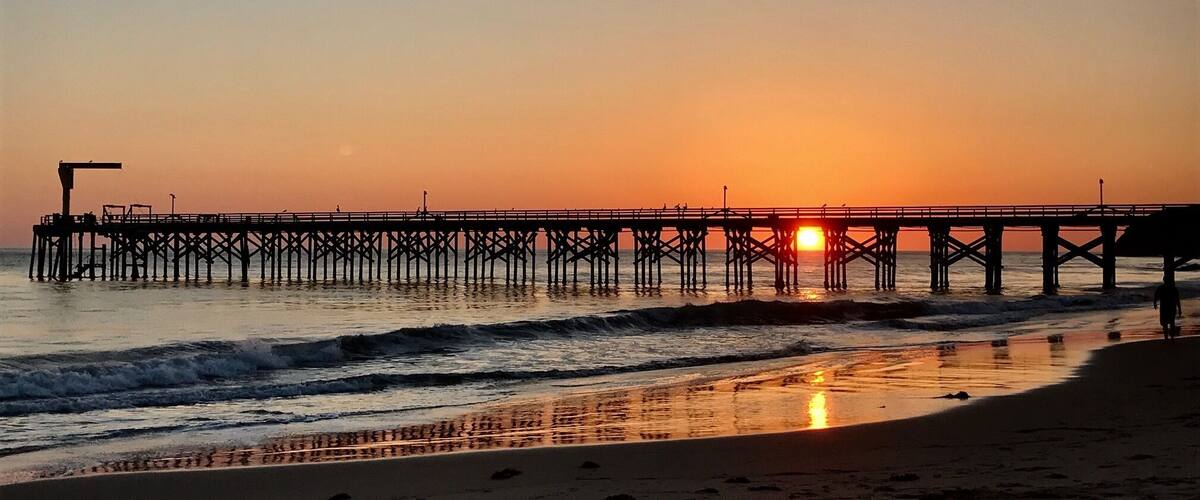 Gaviota is a mostly undeveloped, quiet, rural coastline of Central California. Easy to access from Highway 1 north of Santa Barbara, it has a small pier and boat lift for local fishermen and surfers. There is also a small snack and bait shop, and limited camping spots. This photo was taken on Thanksgiving 2016; the winter sun sank quickly and catching this photo was tricky!