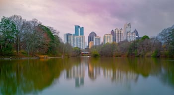 Atlanta City skyline, skyscrapers, buildings, forest, and water reflections over the Lake Clara Meer at Piedmont Park in Georgia, soft pastel colors, long exposure Photo