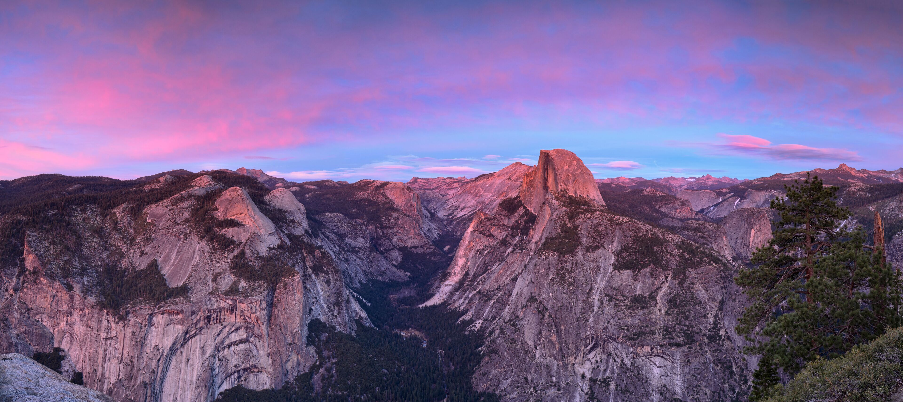 View of Half Dome and Yosemite Valley during sunset