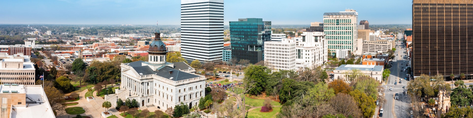 Aerial panorama of the South Carolina Statehouse and Columbia skyline on a sunny morning. Columbia is the capital of the U.S. state of South Carolina and serves as the county seat of Richland County