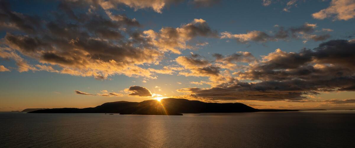 Beautiful Sunset Over Orcas Island, Washington. Orcas Island is the largest of the San Juan Islands of the Pacific Northwest, which are in the northwestern corner of San Juan County, Washington.