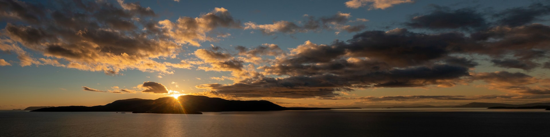 Beautiful Sunset Over Orcas Island, Washington. Orcas Island is the largest of the San Juan Islands of the Pacific Northwest, which are in the northwestern corner of San Juan County, Washington.