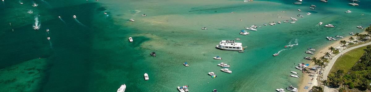 Peanut Island drone photography of boats at the sandbar and Singer Island near West Palm Beach, Florida, Palm Beach County