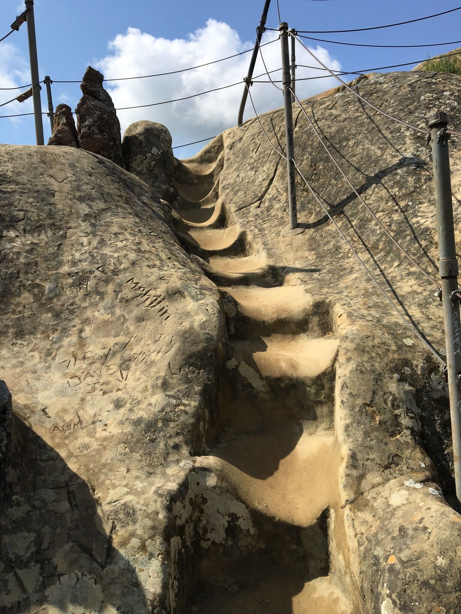 The hike starts by the south entrance to Mt. Diablo State Park and follows the Summit trail past the Live Oak camping area.  From there it's just a short walk to the Rock City area in the park which is marked by a wide variety of rock structures including the so-called 'wind caves'.  These were actually formed through erosion by flowing water creating large hollowed-out areas in the sandstone.  

A prominent feature is Sentinel Rock that stands well above the surroundings and provides a panoramic view from its summit.  There are steps carved into the rock and iron railings at key points for safety when climbing to the top.
