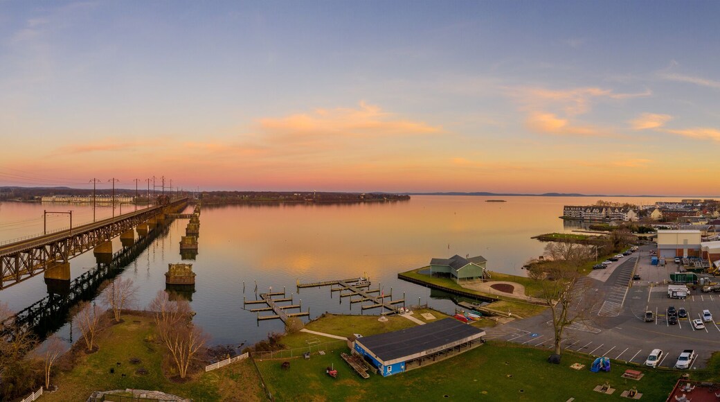 Aerial sunset panorama of Havre De Grace Harford County, Maryland, and the railroad bridge over the mouth of the Susquehanna River and the head of Chesapeake Bay one of the best American small towns