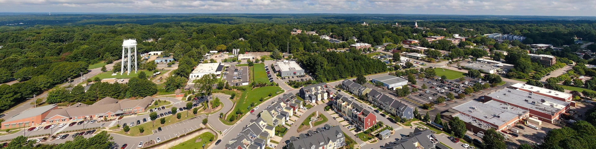 Sunny Daytime Drone Images of Wake Forest, North Carolina Featuring the Downtown Historic District, Businesses, and Residential Developments: Tourism, Real Estate, Travel