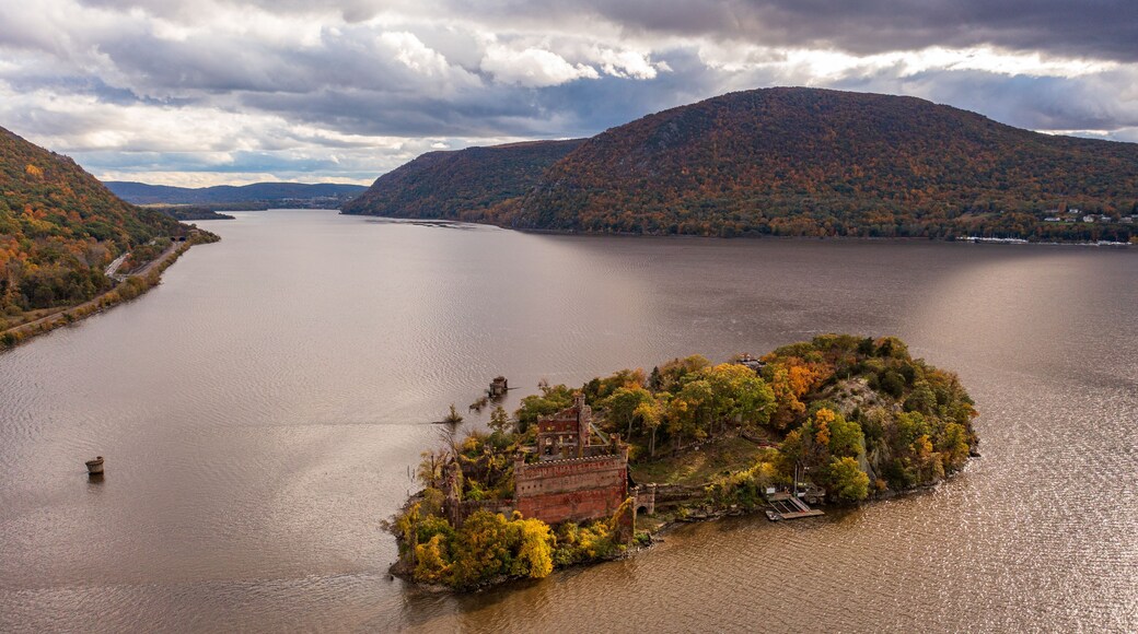 Aerial shot of the Bannerman's Castle on the Hudson River surrounded by hills in Dutchess County