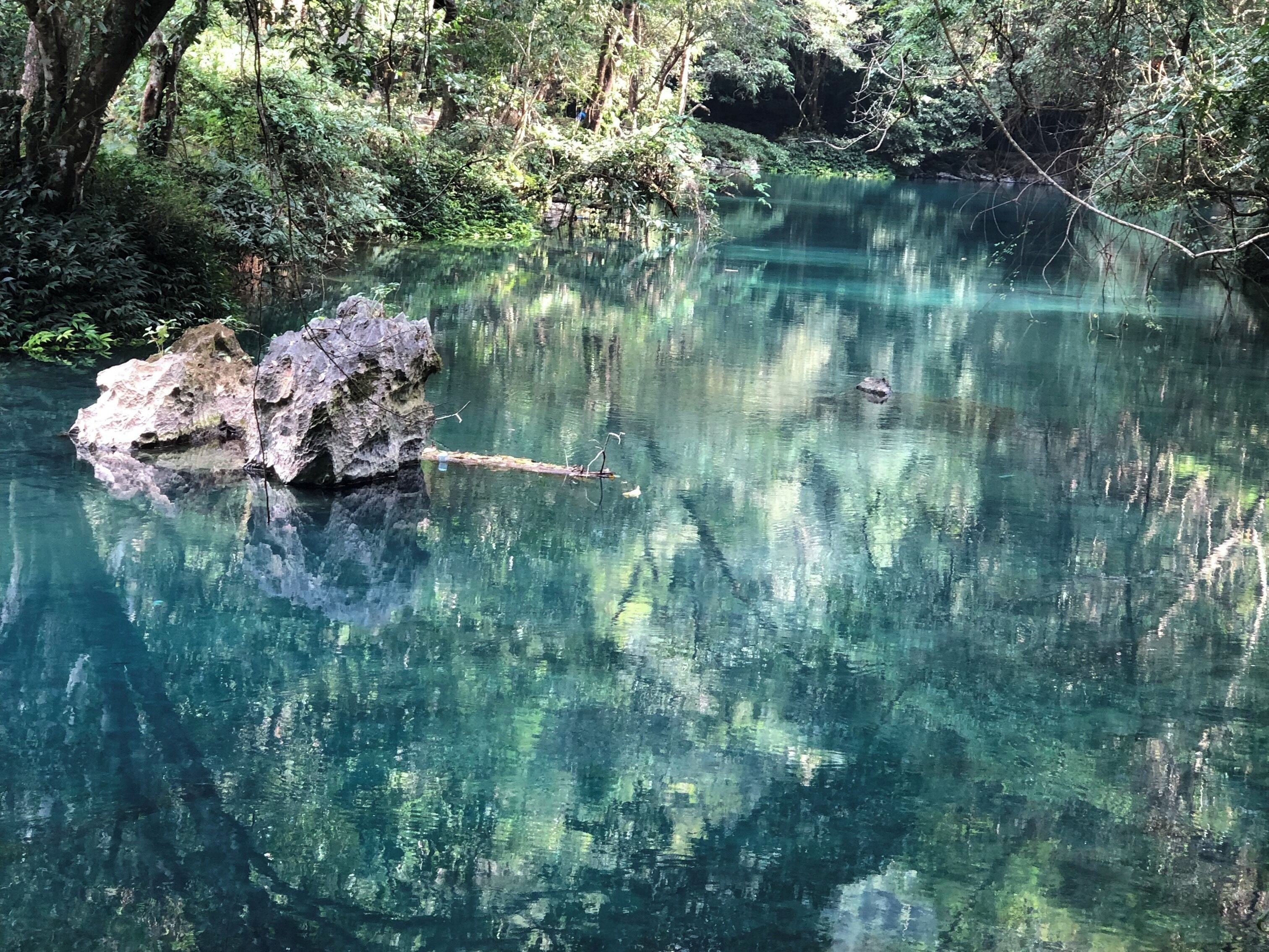 River leading to the cave