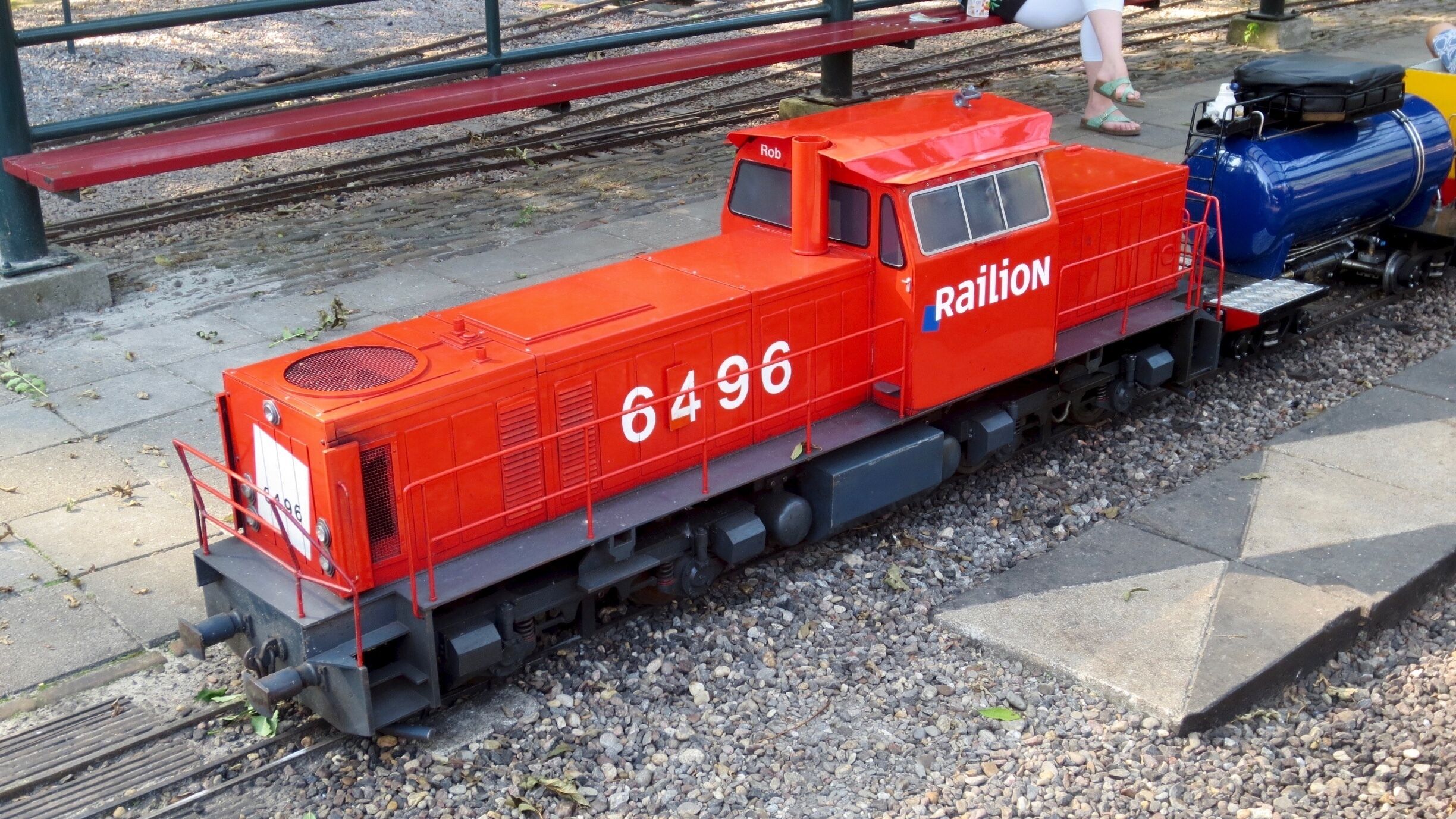 A red model train with the number 6496 and the word "Railion" on its side.