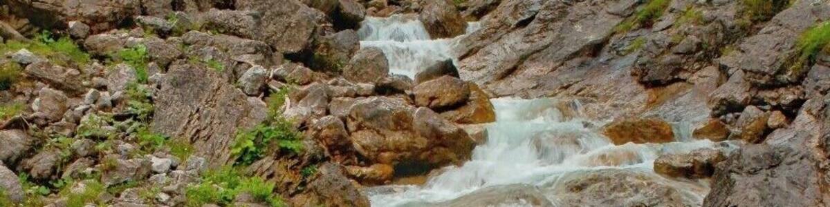 July 2015
Otterbach creek, Lechtal Alps
Otterbach creek as seen at the beginning of the valley running to the village of Gramais in Lechtal Alps in Austria. It is almost the end of the round trek from Gramais over Memminger Huette and back. The descend from Memminger Huette takes some 3 to 4 hours and for us it was quite tough as we had to do it in the full mist and slight rain. However an experience does not have to be always pleasant as long as it is strong :)