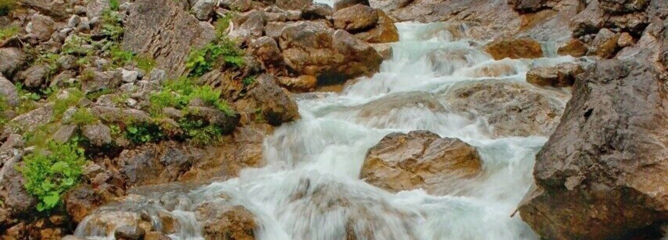 July 2015
Otterbach creek, Lechtal Alps
Otterbach creek as seen at the beginning of the valley running to the village of Gramais in Lechtal Alps in Austria. It is almost the end of the round trek from Gramais over Memminger Huette and back. The descend from Memminger Huette takes some 3 to 4 hours and for us it was quite tough as we had to do it in the full mist and slight rain. However an experience does not have to be always pleasant as long as it is strong :)