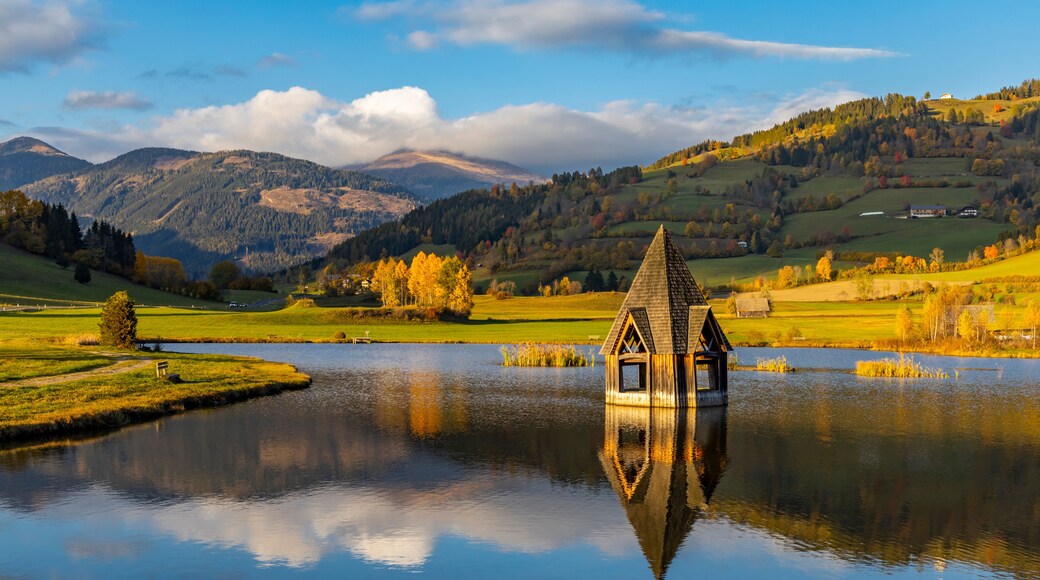autumn pond under the mountains, Murau district,.Styria, Austria
