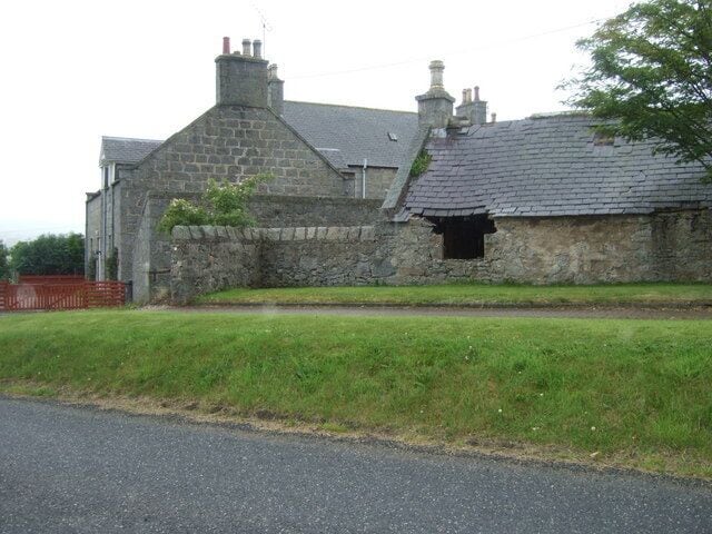 A house with steading The one in better nick than the other. By the old railway station in Whitehouse.