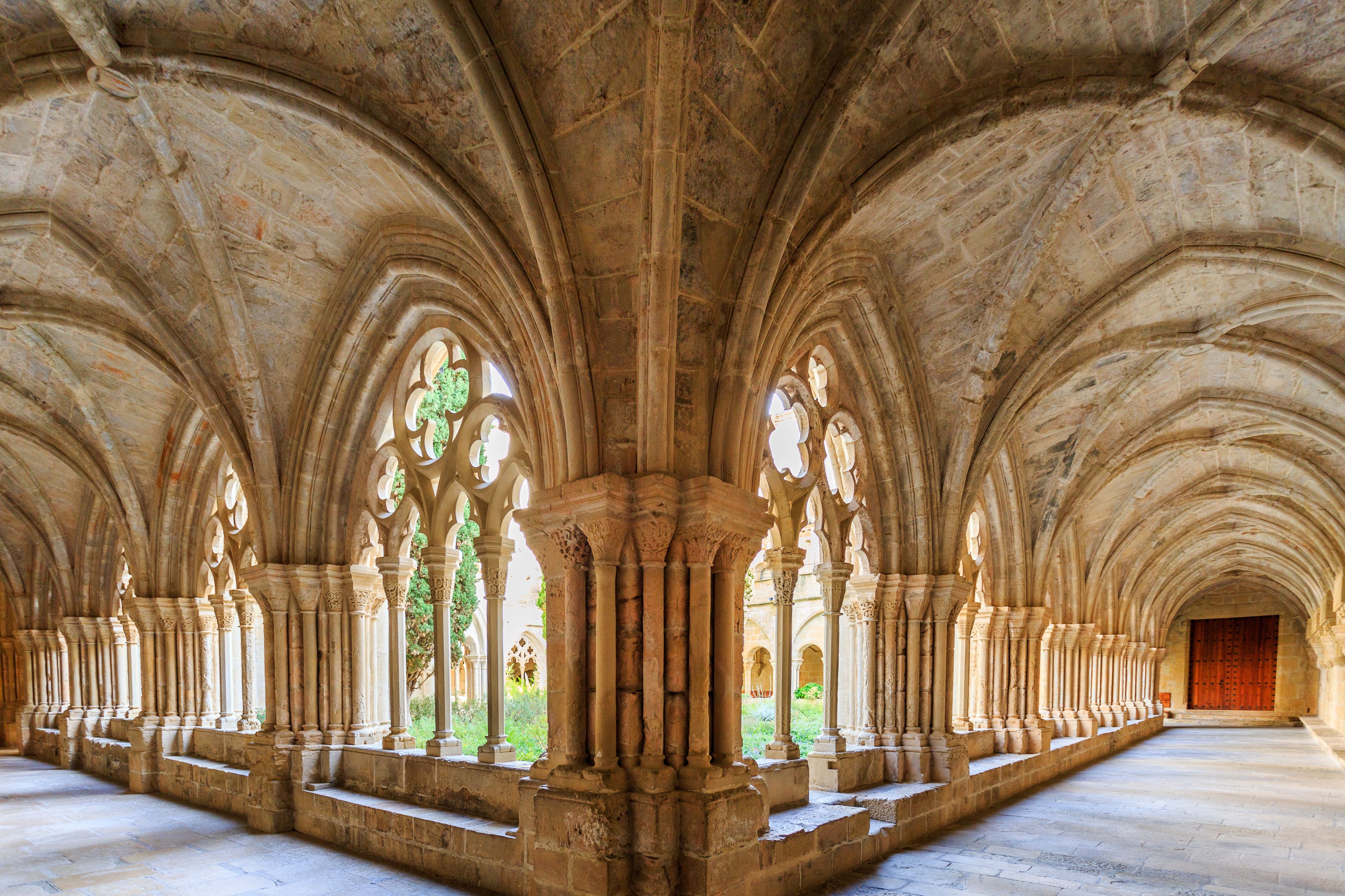 A cathedral interior with arched ceilings and columns.