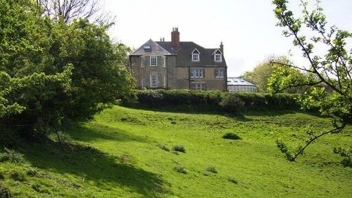 Church Stowe A footpath from the north, used by the Macmillan Way, approaches the road through Church Stowe. This house has a wonderful view of everything to the north.
