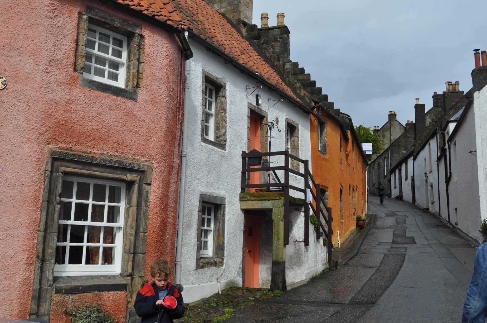 Mid Causeway - Culross. The buildings in this town (particularly the Palace and Mercat Cross) were used extensively as locations in the TV series Outlander.