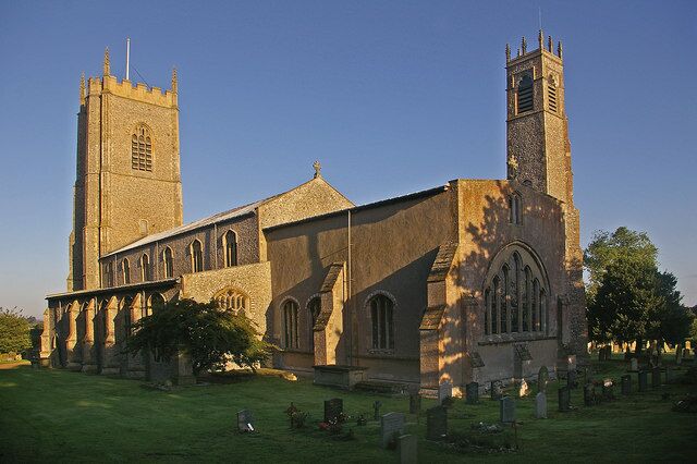 Church of St Nicholas, Blakeney Early morning view of this Grade I listed church from the south east. The unusual 7 light east window can be seen on the right, at the end of the chancel.