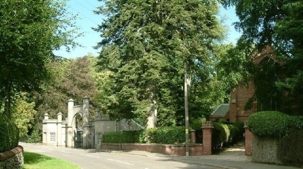 Cortachy Church and Castle Gate. See http://www.visitdunkeld.com/cortachy-castle.htm for some history of the castle and the Ogilvy family. The Ogilvy family mausoleum is in an extension to the church.