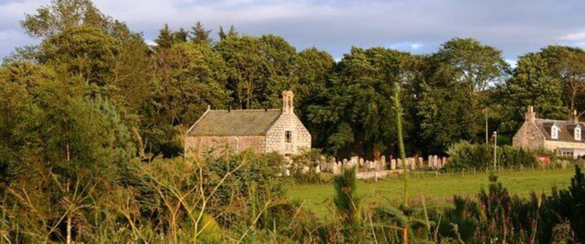 Leslie Kirk Half hidden by trees the kirk and kirkyard of Leslie.