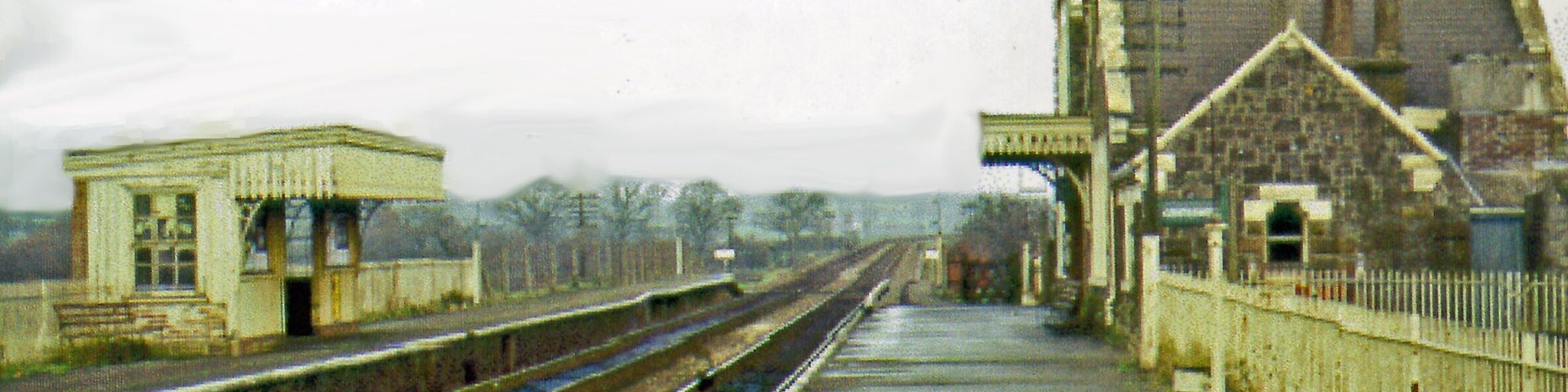 Bow (Devon) station, 1968. View eastward, towards Yeoford and Exeter: ex-LSWR Exeter - Okehampton - Plymouth etc. main line. The station and the line were closed to passenegers from 5/6/72, but the line remained through Okehampton to Meldon Quarry for freight. Okehampton station was restored in 1997 and currently sees a 'heritage' Dartmoor Railway service between Sampford Courtenay and Meldon, run from Exeter by National Rail on Sundays.