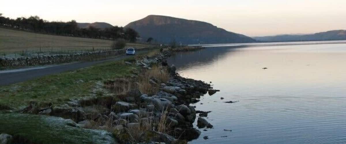 Loch Fleet. Looking west along the south shore of Loch Fleet to Creag an Amalaidh.