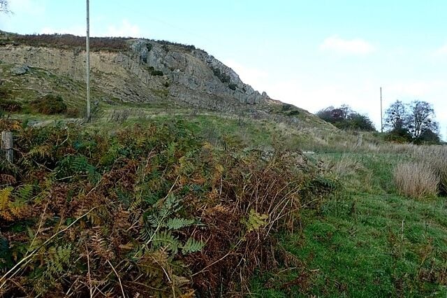 Quarry at Mynydd Llwytgoed A natural rock formation at the edge of steeper land has been used in the past for small scale quarrying.