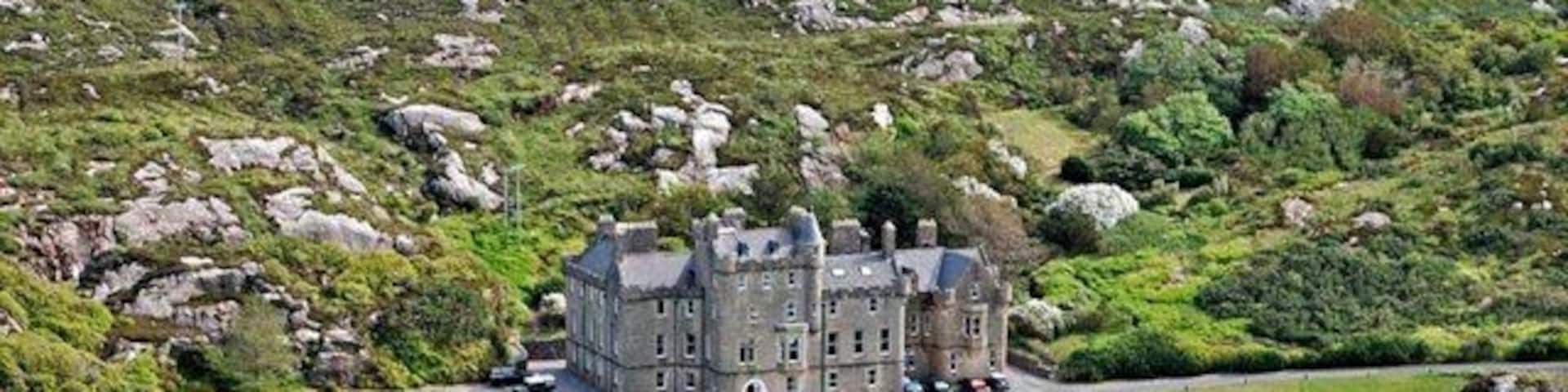 Amhuinnsuidhe Castle Amhuinnsuidhe Castle dates from 1868. Built by architect David Bryce in the Scottish Baronial style for Charles Murray, the 7th Earl of Dunmore. This is a fine country house and looks out into Loch Leosavay, an opening in West Loch Tarbert. The castle and estate passed through the hands of Lord Leverhulme, the Scott family and Sir Thomas Sopwith, the aircraft-manufacturing tycoon, its also been owned by the Bulmer (cider) family. The castle was separated from much of its North Harris estate following a buy-out by the local community in 2002. It's now used for sporting events and corporate entertaining