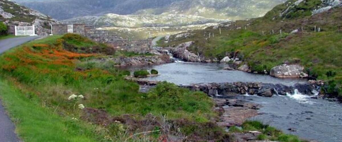 River at Amhuinnsuidhe Castle The public road to Hushinish goes staight through the castle grounds and directly in front of the building. The castle gates can be seen on the right of picture.