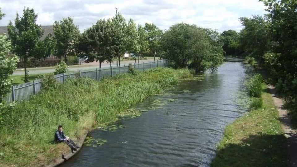 Wyrley and Essington Canal Alongside Hawbush Road. The Curly Wyrley wanders around following the contours avoiding the need for locks.