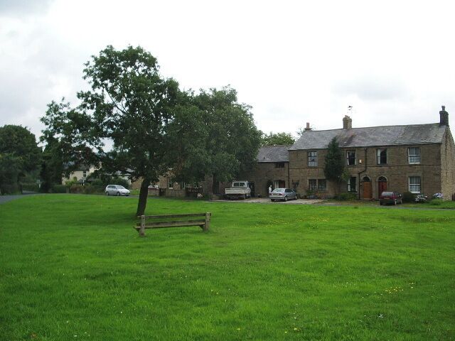 Inglewhite village green. The building to the left was once the Queen's Arms public house.