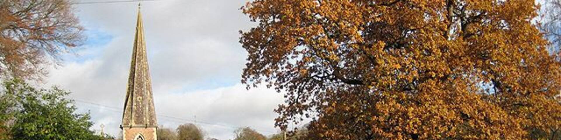 St Peter's Church, Clearwell Viewed from the driveway to Clearwell Castle. The church, designed by John Middleton of Cheltenham for Caroline, Countess of Dunraven, owner of the nearby Clearwell Castle (or Clearwell Court as it was known at that time), dates from 1866 and is of French Gothic style utilising local red sandstone with Bath stone dressings. The tower and spire stand at the southwest corner. The church replaced an earlier medieval church on a different site.