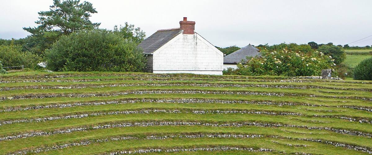 Methodist open air meeting place. 1762, remodelled in 1806. Conical pit made in fallen-in mine shaft which was used by John Wesley for preaching in 1762, and remodelled and reduced in size in 1806, to 360 feet circumference and 16 feet depth, with 13 circles of tufted seating faced with random rubble. On the west side a flight of segmental steps is built into the terraces, and to the north round the 4th step down is a pair of stone posts with a rectangular boulder between them (probably the "pulpit"). Used for Whit Monday services annually from 1807 to 1966.