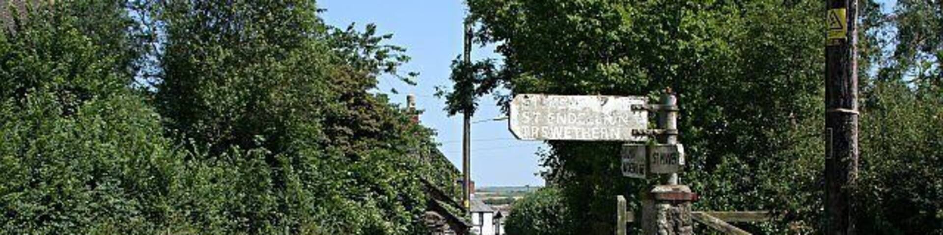 An Unusual Fingerpost. This signpost is unusually mounted on a granite post and it is not the only one in the village of Chapel Amble. There is at least one more.