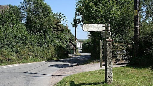 An Unusual Fingerpost. This signpost is unusually mounted on a granite post and it is not the only one in the village of Chapel Amble. There is at least one more.