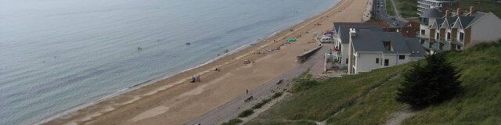 Beach below Furzy Cliff Weymouth is in the distant centre of the photograph.