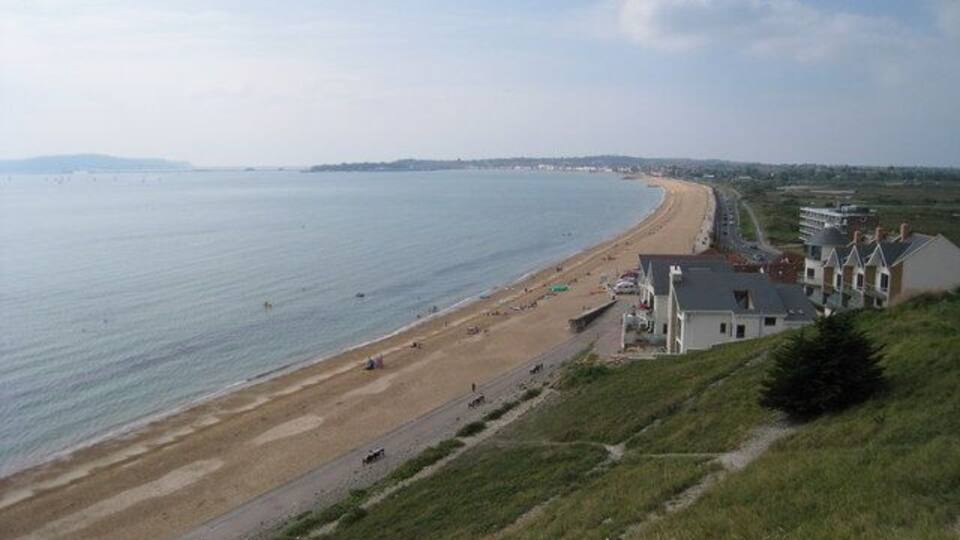 Beach below Furzy Cliff Weymouth is in the distant centre of the photograph.