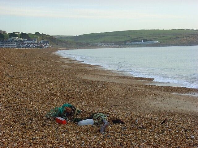 Preston and Overcombe Beach Overcombe starts on the left and goes inland from there. The hotel at Bowleaze Cove is towards the right.