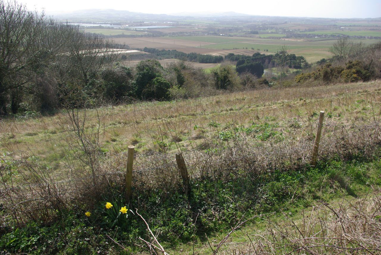 Mersley Down From the Newport - Brading road there is a view from the high point of Mersley Down across the Yar valley to the downs of south Wight.