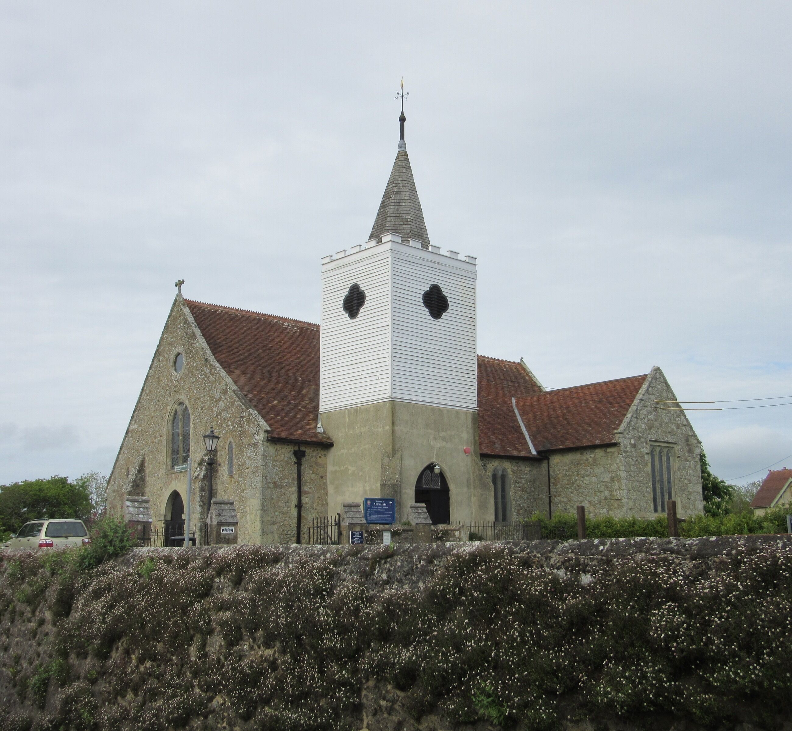 All Saints Church, High Street, Newchurch, Isle of Wight, England. The Anglican parish church of the village of Newchurch.