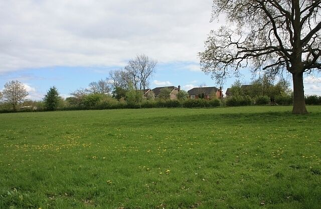 Modern development, Canon Frome A small housing estate around older farm buildings marked on the maps as "The Barn". Viewed from the footpath from Canon Frome church.