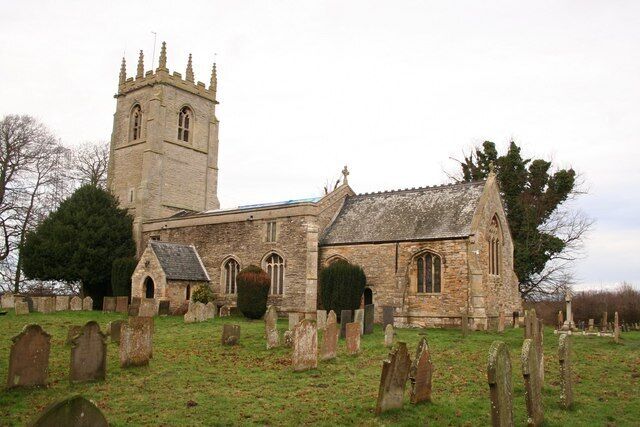 Parish church of St George the Martyr, Clifton, Nottinghamshire, seen from the southeast. The blue tarpaulin on the nave roof covers the area from which lead was stolen in December 2007