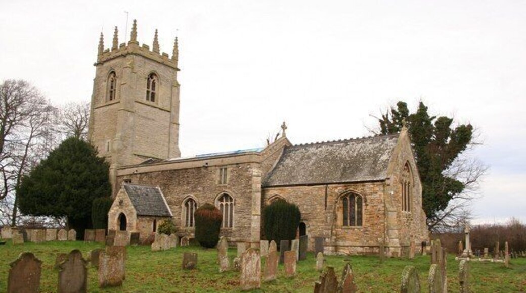 Parish church of St George the Martyr, Clifton, Nottinghamshire, seen from the southeast. The blue tarpaulin on the nave roof covers the area from which lead was stolen in December 2007