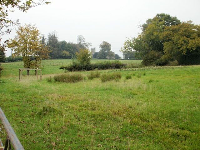The view north from Caerleon Road, Ponthir. In the distance, seen through a gap in the trees, is All Saints Church, Llanfrechfa. 1634301