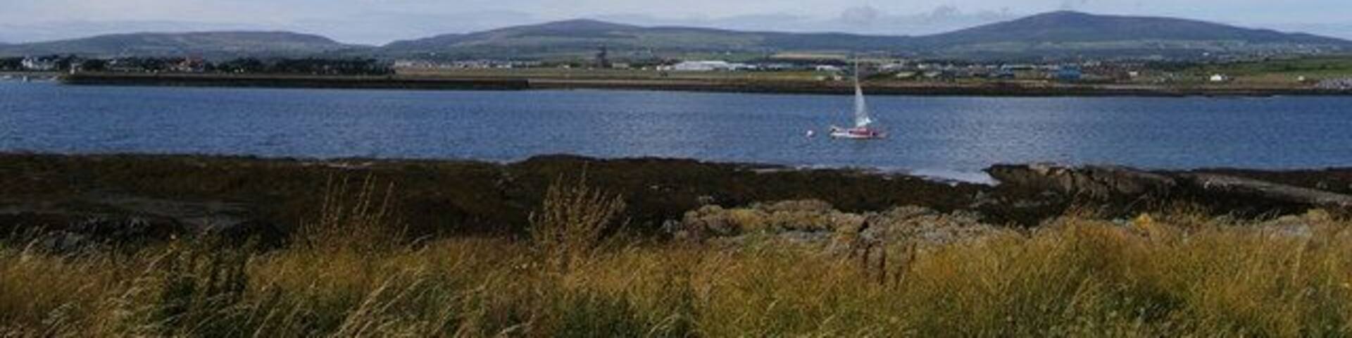 Panorama including Ronaldsway Airport from St Michaels Island The new control tower under construction is just visible in the centre.