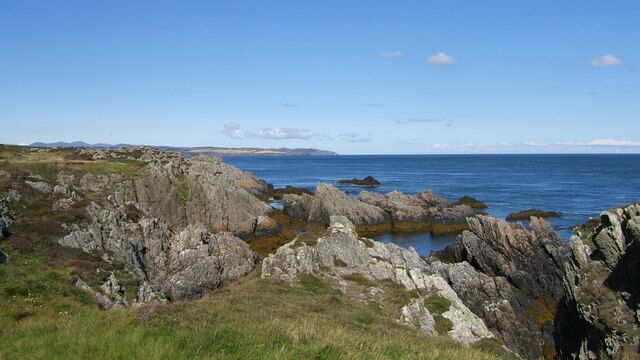 Coastline near Dreswick Point towards Santon Head Panoramic shot of the coastline revealing the upward strata of the rocks.