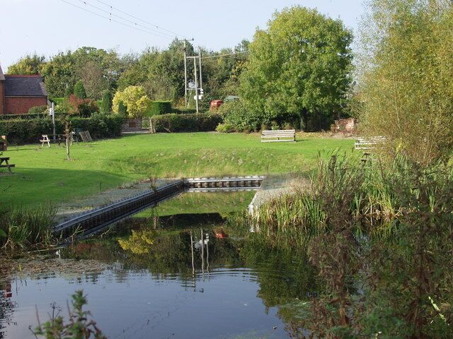 Montgomery Canal, Glanfa'r Dwr Llydan - Wide Water Wharf. The basic wharf was built by British Waterways when the canal was upgraded several years ago. The village has made the area a great open space with seats, mowed grass and a barbecue.