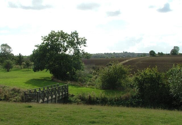 Bridge over the mill stream. Footbridge forming part of The Centenary Way at Fell Mill, River Stour.