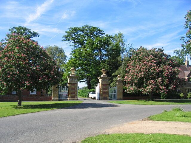 Gateway to Honington Hall. The imposing gateway Honington Hall driveway from the village.